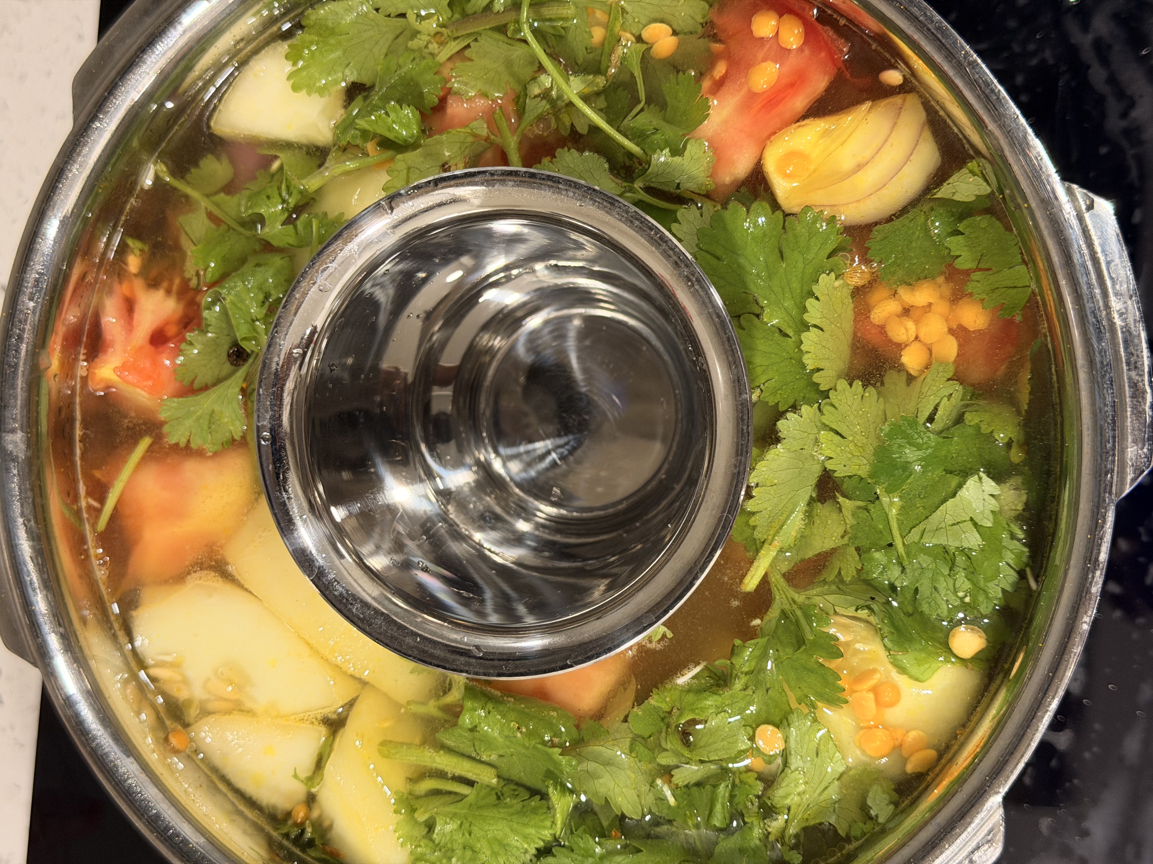 Tumbler inside cooker